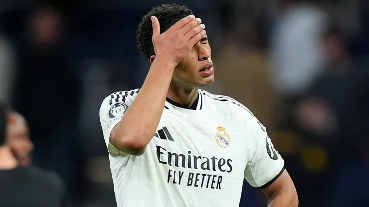 Jude Bellingham of Real Madrid looks dejected after the team's defeat in the UEFA Champions League 2024/25 Quarter Final Second Leg match between Real Madrid C.F. and Arsenal FC at Estadio Santiago Bernabeu on April 16, 2025 in Madrid, Spain.