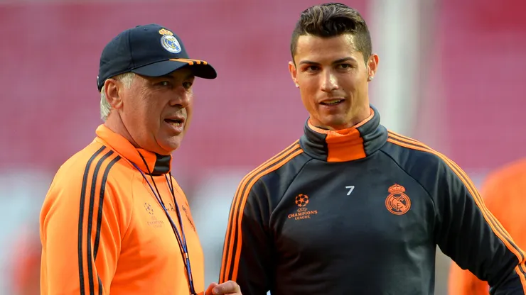 Head Coach, Carlo Ancelotti of Real Madrid speaks with Cristiano Ronaldo of Real Madrid during a Real Madrid training session ahead of the UEFA Champions League Final against Club Atletico de Madrid at Estadio da Luz on May 23, 2014 in Lisbon, Portugal.