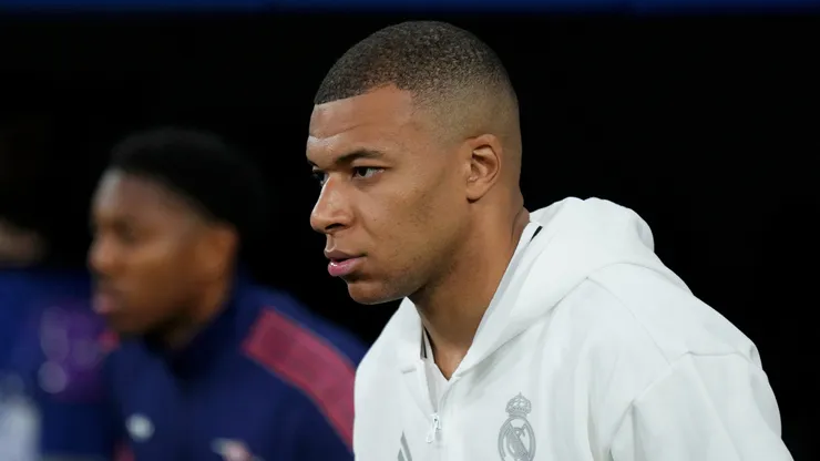 Kylian Mbappe of Real Madrid walks out onto the pitch prior to the UEFA Champions League 2024/25 Quarter Final Second Leg match between Real Madrid C.F. and Arsenal FC at Estadio Santiago Bernabeu on April 16, 2025 in Madrid, Spain.