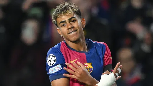 Lamine Yamal of FC Barcelona celebrates scoring his team's second goal during the UEFA Champions League 2024/25 UEFA Champions League 2024/25 Round of 16 Second Leg match between FC Barcelona and SL Benfica at Estadi Olímpic Lluís Companys on March 11, 2025 in Barcelona, Spain.