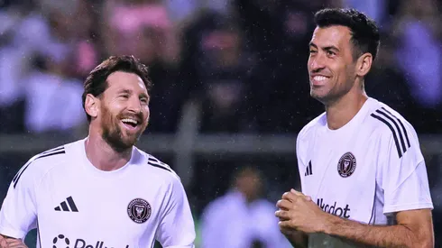Lionel Messi of Inter Miami speaks with Sergio Busquets of Inter Miami during the warm-ups prior to prior to a friendly match between Olimpia and Inter Miami at Estadio Olimpico Metropolitano on February 08, 2025 in San Pedro Sula, Honduras.