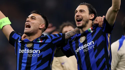Lautaro Martinez and Matteo Darmian of FC Internazionale celebrate after their team's 4-3 victory in the UEFA Champions League 2024/25 Semi Final Second Leg match between FC Internazionale Milano and FC Barcelona at Giuseppe Meazza Stadium on May 06, 2025 in Milan, Italy.