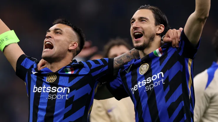 Lautaro Martinez and Matteo Darmian of FC Internazionale celebrate after their team's 4-3 victory in the UEFA Champions League 2024/25 Semi Final Second Leg match between FC Internazionale Milano and FC Barcelona at Giuseppe Meazza Stadium on May 06, 2025 in Milan, Italy.