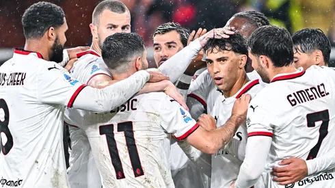 Milan players celebrate after Morten Frendrup of Genoa's own-goal during the Serie A match between Genoa and AC Milan at Stadio Luigi Ferraris on May 5, 2025 in Genoa, Italy.