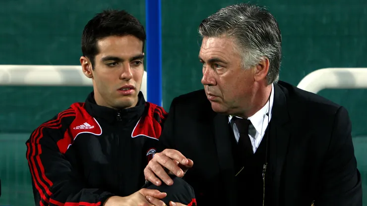 aka (L) of AC Milan speaks with Carlo Ancelotti (R), manager of AC Milan before the Dubai Football Challenge match between AC Milan and Hamburger SV at The Emirates Sevens Stadium on January 6, 2009 in Dubai, United Arab Emirates.