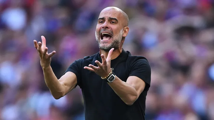 Pep Guardiola, Manager of Manchester City, reacts during the Emirates FA Cup Final match between Crystal Palace and Manchester City at Wembley Stadium on May 17, 2025 in London, England.