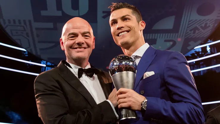 FIFA president Gianni Infantino (L) and The Best FIFA Men's Player Award winner Cristiano Ronaldo of Portugal and Real Madrid pose for a photo after The Best FIFA Football Awards 2016 on January 9, 2017 in Zurich, Switzerland.