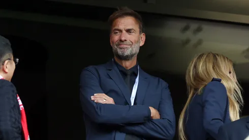 Former Liverpool Manager and current Head of Global Soccer for Red Bull GmbH Juergen Klopp looks on from an executive box prior to the Premier League match between Liverpool FC and Crystal Palace FC at Anfield on May 25, 2025 in Liverpool, England.