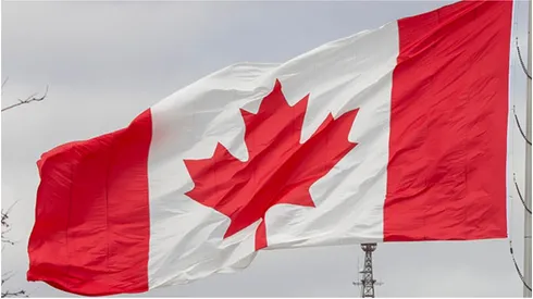 A Canadian flag flies