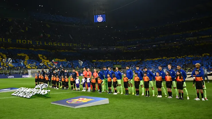 A general view as players and officials line up for the anthem prior to the UEFA Champions League 2024/25 Semi Final Second Leg match between FC Internazionale Milano and FC Barcelona at Giuseppe Meazza Stadium on May 06, 2025 in Milan, Italy.