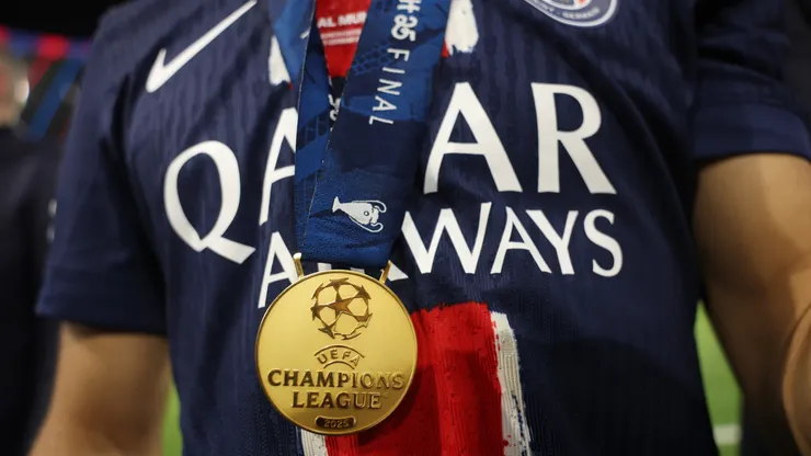 A detailed view of the UEFA Champions League winners medal worn by Achraf Hakimi of Paris Saint-Germain.