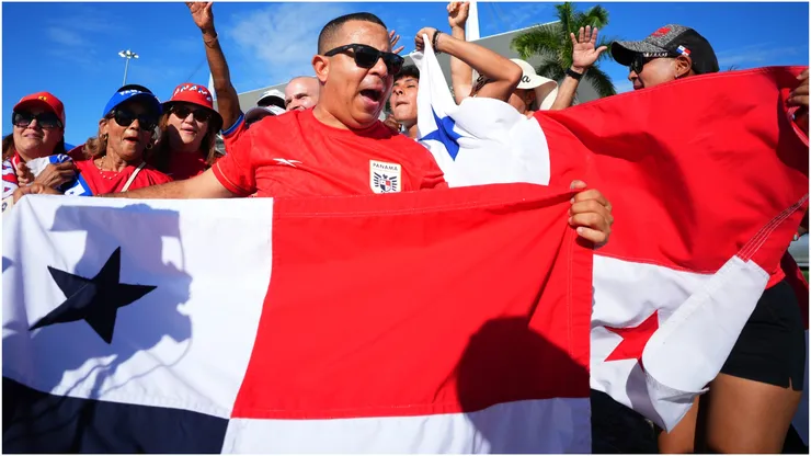 Fans of Panama cheer with flags