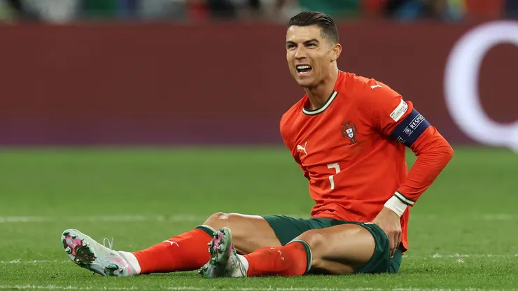 Cristiano Ronaldo of Portugal reacts following an injury during the UEFA Nations League 2025 final match between Portugal and Spain at Munich Football Arena on June 08, 2025 in Munich, Germany.