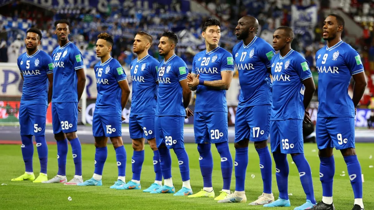 The players of Al Hilal line up on the pitch prior to kick off in the FIFA Club World Cup UAE 2021 2nd Round match between Al Hilal and Al Jazira in 2022. (Source: Francois Nel/Getty Images)