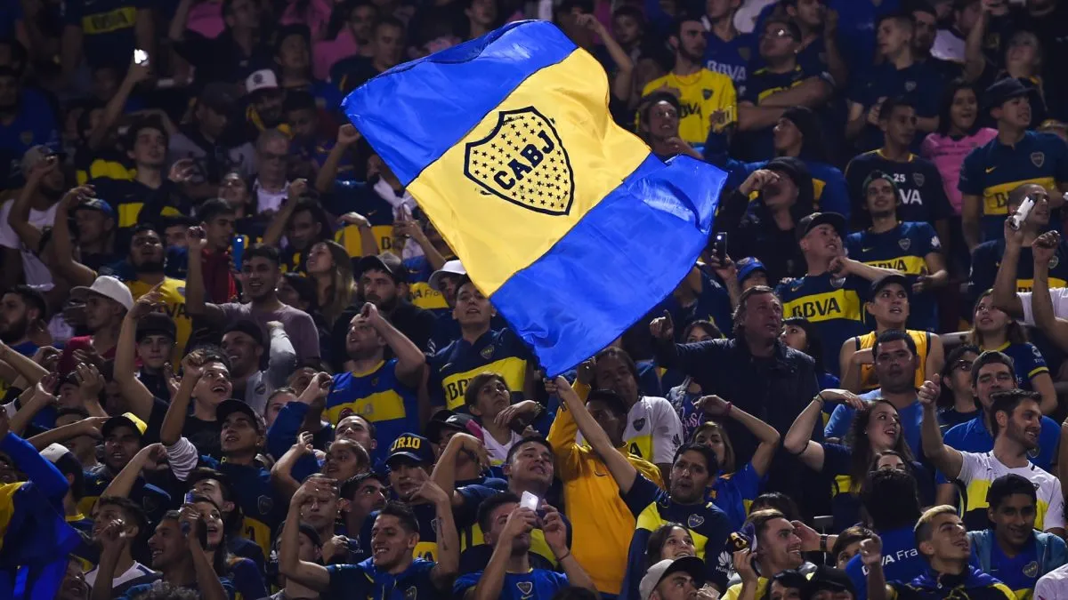 Fans of Boca Juniors wave a flag to celebrate during the celebration event after winning the Argentina Superliga 2017/18 at Estadio Alberto J. Armando in La Boca, Argentina. (Source: Marcelo Endelli/Getty Images)