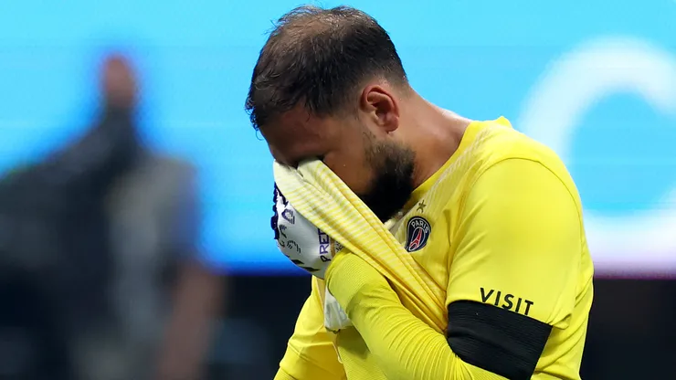 Gianluigi Donnarumma #1 of Paris Saint-Germain reacts after colliding with Jamal Musiala #42 of FC Bayern Munchen during the FIFA Club World Cup 2025 quarter-final match between Paris Saint-Germain and FC Bayern München at Mercedes-Benz Stadium on July 05, 2025 in Atlanta, Georgia.