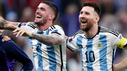 Rodrigo De Paul and Lionel Messi of Argentina celebrate after the team's victory during the FIFA World Cup Qatar 2022 semi final match between Argentina and Croatia at Lusail Stadium on December 13, 2022 in Lusail City, Qatar.