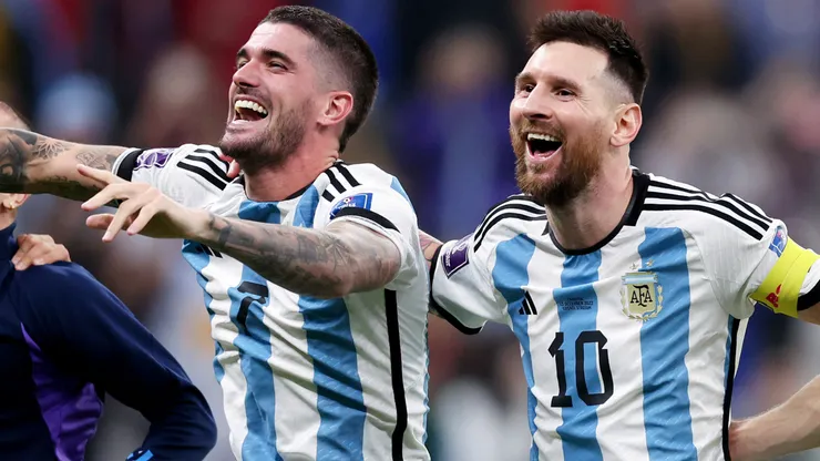 Rodrigo De Paul and Lionel Messi of Argentina celebrate after the team's victory during the FIFA World Cup Qatar 2022 semi final match between Argentina and Croatia at Lusail Stadium on December 13, 2022 in Lusail City, Qatar.