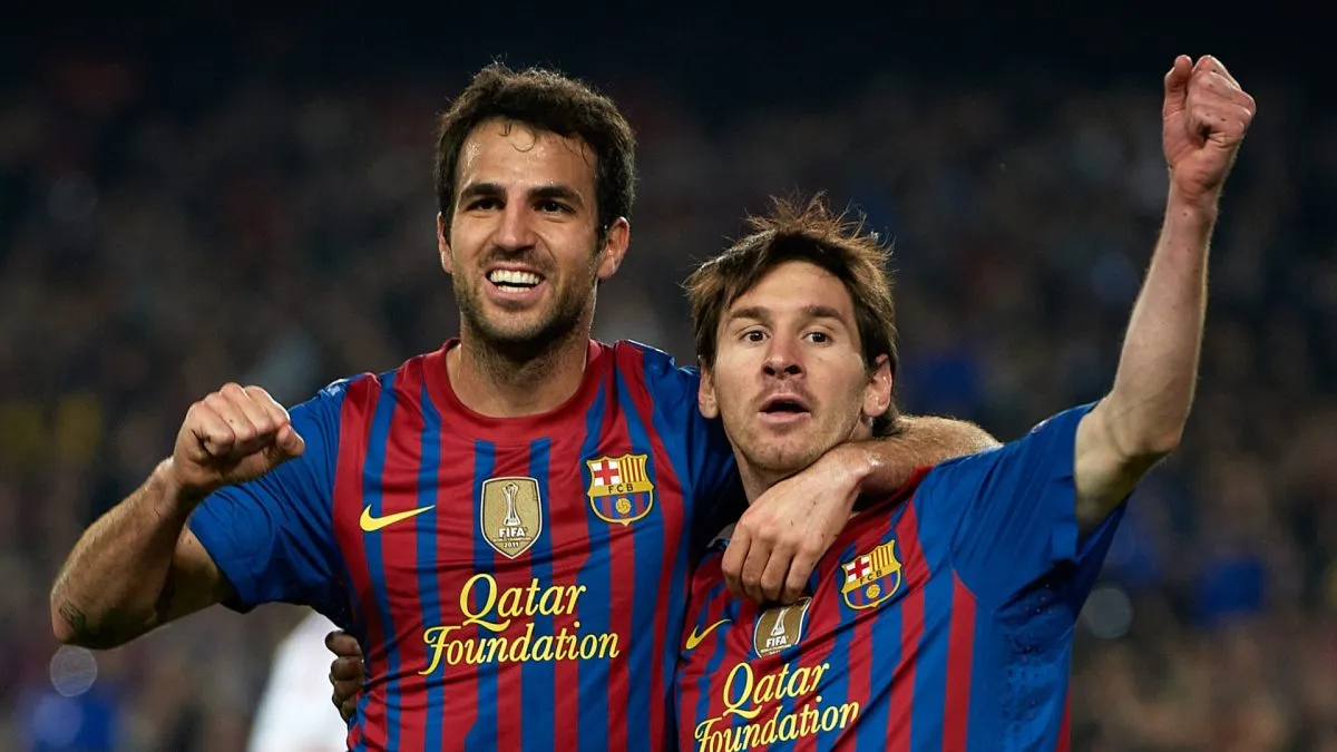 BARCELONA, SPAIN – APRIL 03:  Lionel Messi of Barcelona celebrates scoring with his teammate Cesc Fabregas during the UEFA Champions League quarter-final second leg match between FC Barcelona and AC Milan at the Camp Nou stadium on April 3, 2012 in Barcelona, Spain.  (Photo by Manuel Queimadelos Alonso/Getty Images)