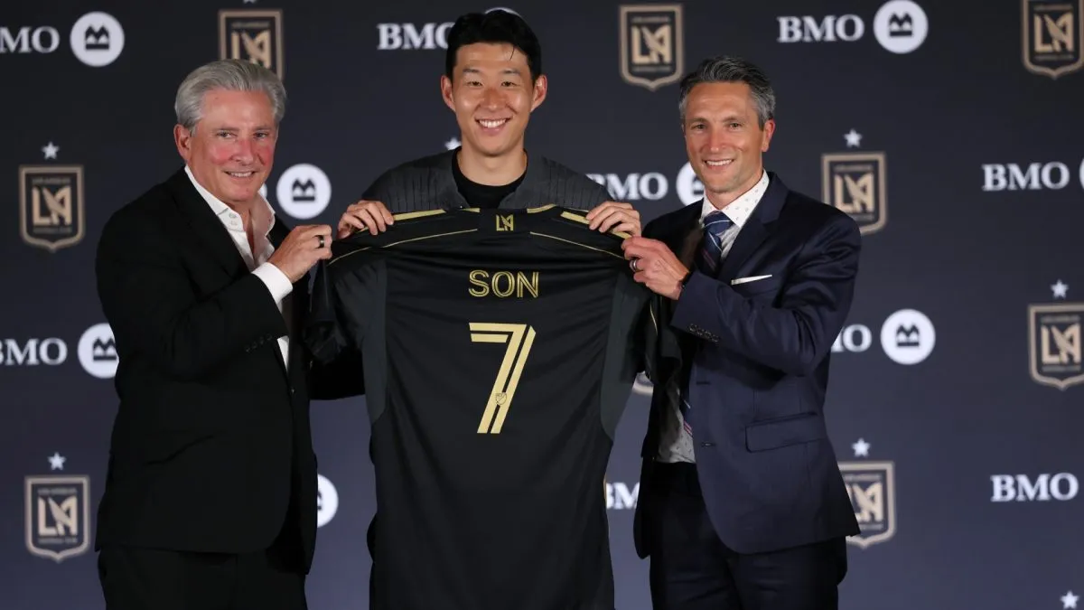 Son Hueng-Min is introduced by Los Angeles Football Club owner Bennett Rosenthal and general manager John Thorrington.