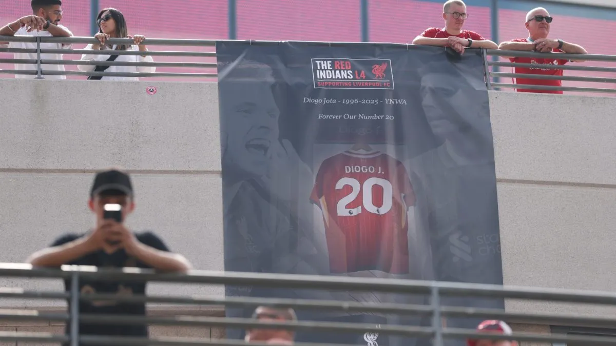 A banner features a tribute to former Liverpool player Diogo Jota, prior to the 2025 FA Community Shield match between Crystal Palace and Liverpool.