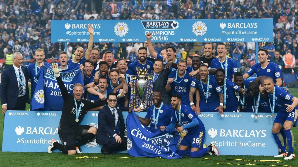 Leicester City players celebrate the season champions with the Premier League Trophy after the Barclays Premier League match on May 7, 2016. (Source: Laurence Griffiths/Getty Images)