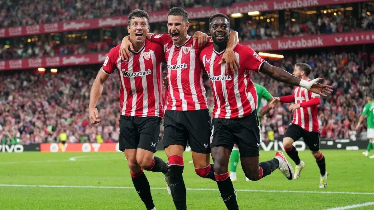 Gorka Guruzeta celebrates with team mates after scoring their sides third goal during the LaLiga EA Sports match between Athletic Bilbao and Real Betis on August 27, 2023. (Source: Manuel Serrano Arce/Getty Images)