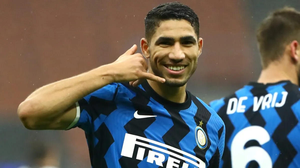 Achraf Hakimi of Inter Milan celebrates after scoring their team’s first goal during the Serie A match in 2020. (Source: Marco Luzzani/Getty Images)