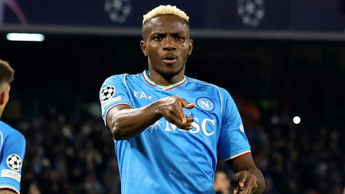 Victor Osimhen of SSC Napoli celebrates scoring his team’s first goal during the UEFA Champions League 2023/24 round of 16 first leg match. (Source: Francesco Pecoraro/Getty Images)