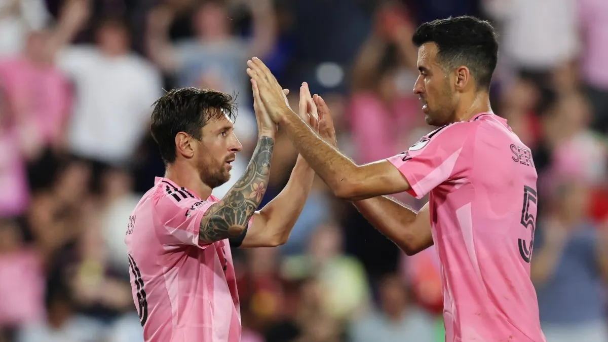 Lionel Messi #10 of Inter Miami CF celebrates after scoring the team's fifth goal with teammate Sergio Busquets #5 during the MLS match between New York Red Bulls and Inter Miami CF at Sports Illustrated Stadium on July 19, 2025 in Harrison, New Jersey.