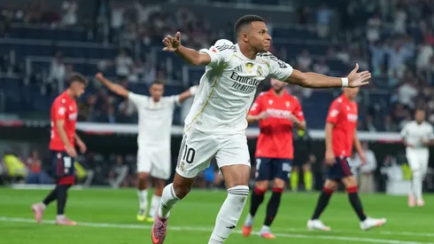 Mbappe celebrates after scoring a goal for Real Madrid.