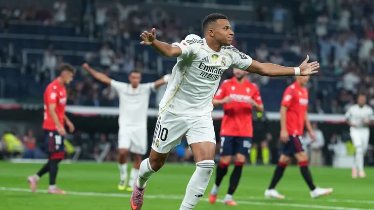 Mbappe celebrates after scoring a goal for Real Madrid.