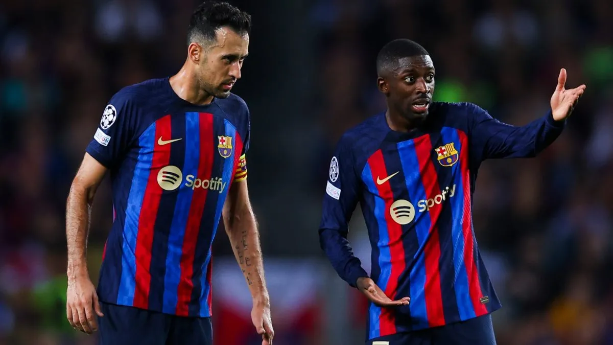 Sergio Busquets and Ousmane Dembele of FC Barcelona speaks during the UEFA Champions League group C match between FC Barcelona and FC Internazionale.