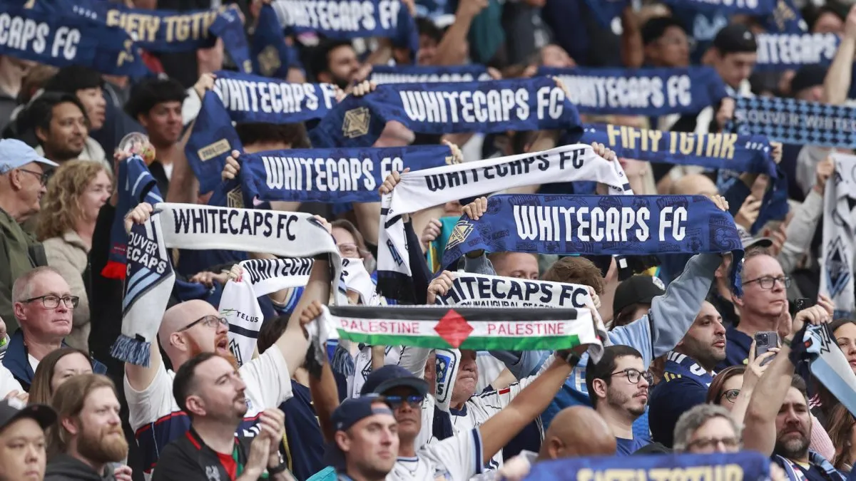 Vancouver Whitecaps fans hold banners during the MLS match against Inter Miami CF in 2024. (Source: Jeff Vinnick/Getty Images)