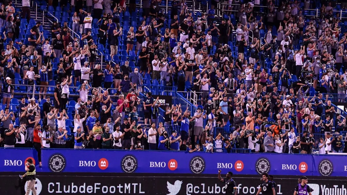 Fans cheer on CF Montreal for their victory against FC Cincinnati during the MLS game in 2021. (Source: Minas Panagiotakis/Getty Images)