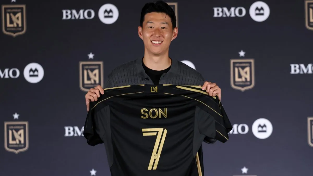 Son Hueng-Min of Los Angeles Football Club poses with his jersey after he was introduced during a news conference at BMO Stadium on August 6, 2025 in Los Angeles, California.