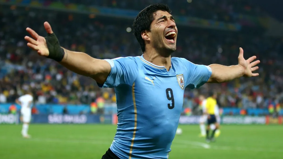 Luis Suarez celebrates after scoring his team’s second goal during the 2014 FIFA World Cup Brazil Group D match. (Source: Julian Finney/Getty Images)