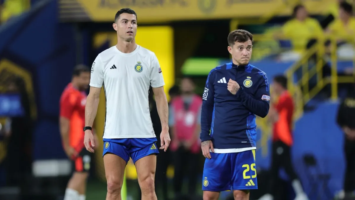 Cristiano Ronaldo and Otavio of Al Nassr look on during the warm up prior to the Saudi Pro League match between Al Nassr v Al Riyadh at Al-Awwal Park on April 12, 2025 in Riyadh, Saudi Arabia.