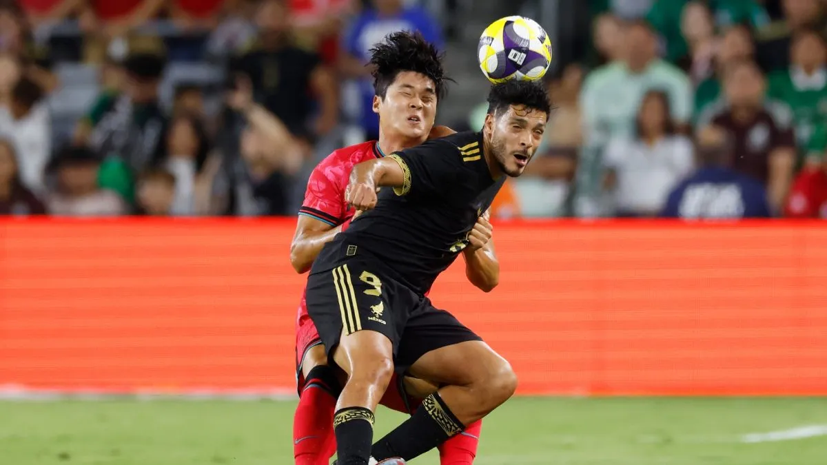 Raul Jimenez #9 of Mexico and Minjae Kim #4 of South Korea battle for the ball during the first half of the match at GEODIS Park on September 09, 2025 in Nashville, Tennessee.