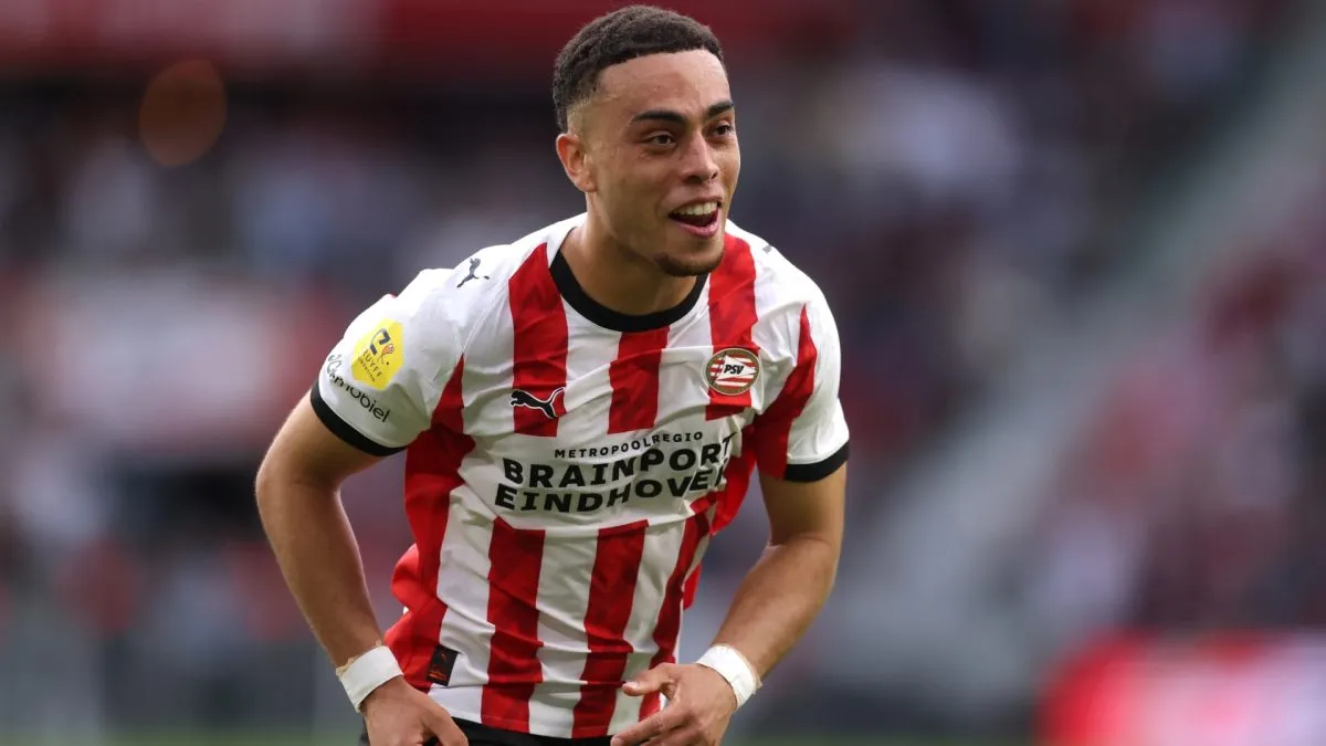 Sergino Dest of PSV Eindhoven celebrates scoring his team’s second goal in 2025. (Source: Dean Mouhtaropoulos/Getty Images)