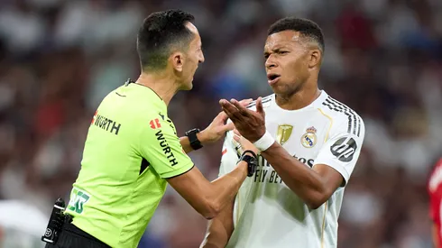 Kylian Mbappe speaks with Referee Jose Maria Sanchez Martinez during the La Liga match between Real Madrid and Mallorca.