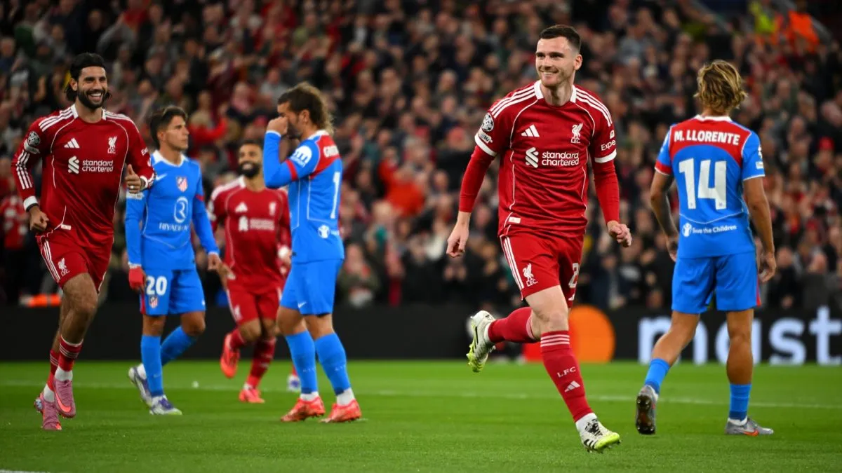 Andrew Robertson of Liverpool celebrates scoring his team's first goal during the UEFA Champions League 2025/26 League Phase MD1 match between Liverpool FC and Atletico de Madrid at Anfield on September 17, 2025 in Liverpool, England.