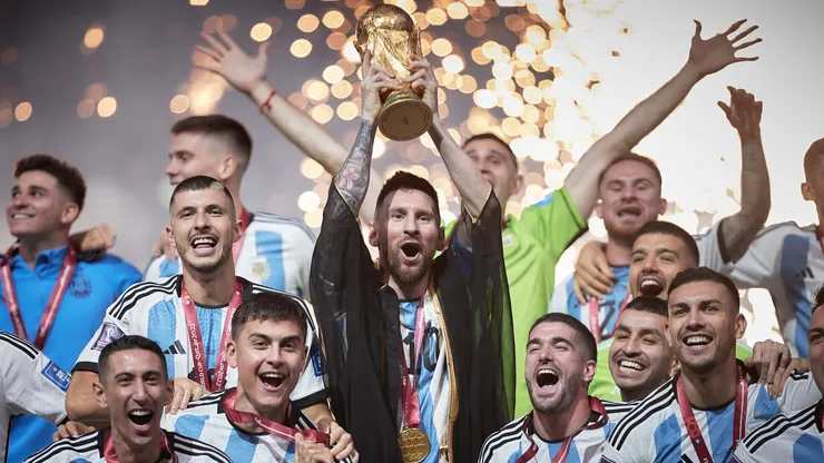 Lionel Messi of Argentina holds the FIFA World Cup trophy.