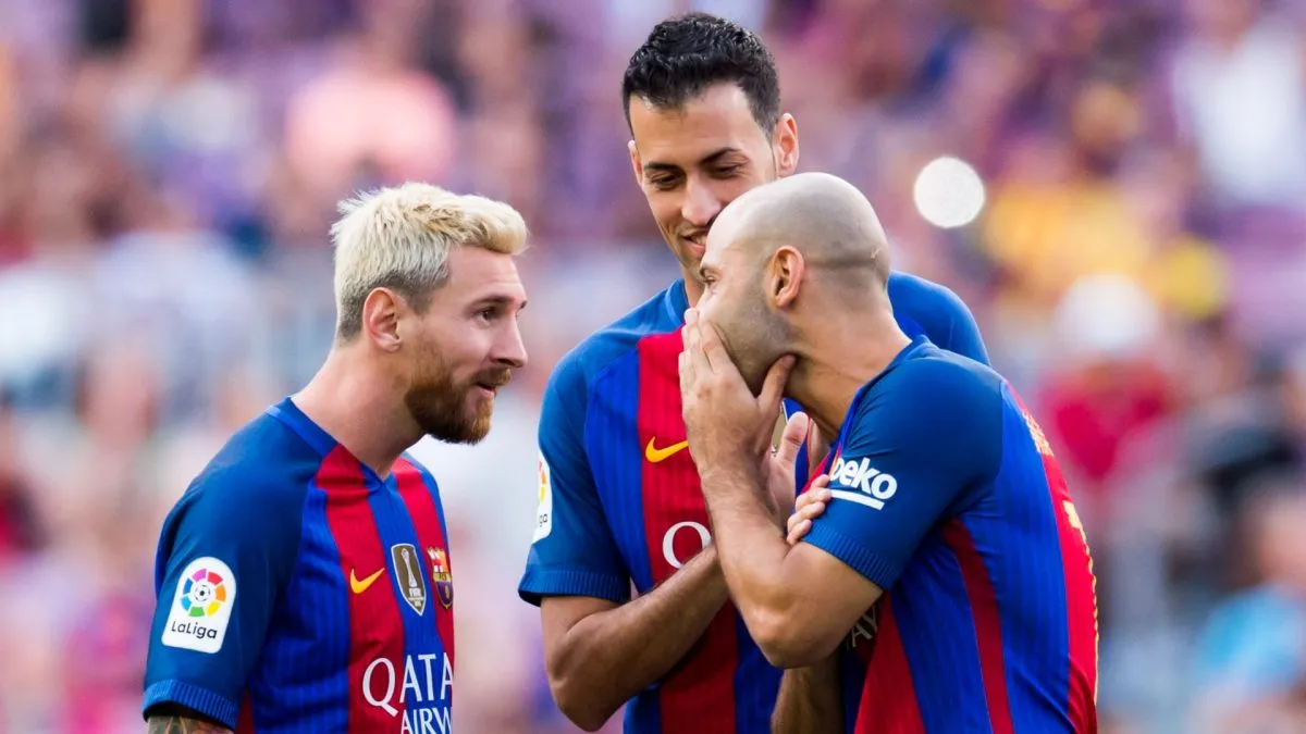 Lionel Messi, Sergio Busquets, and Javier Mascherano playing for Barcelona.
