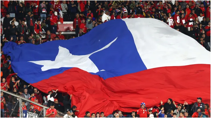 Fans display the flag of Chile