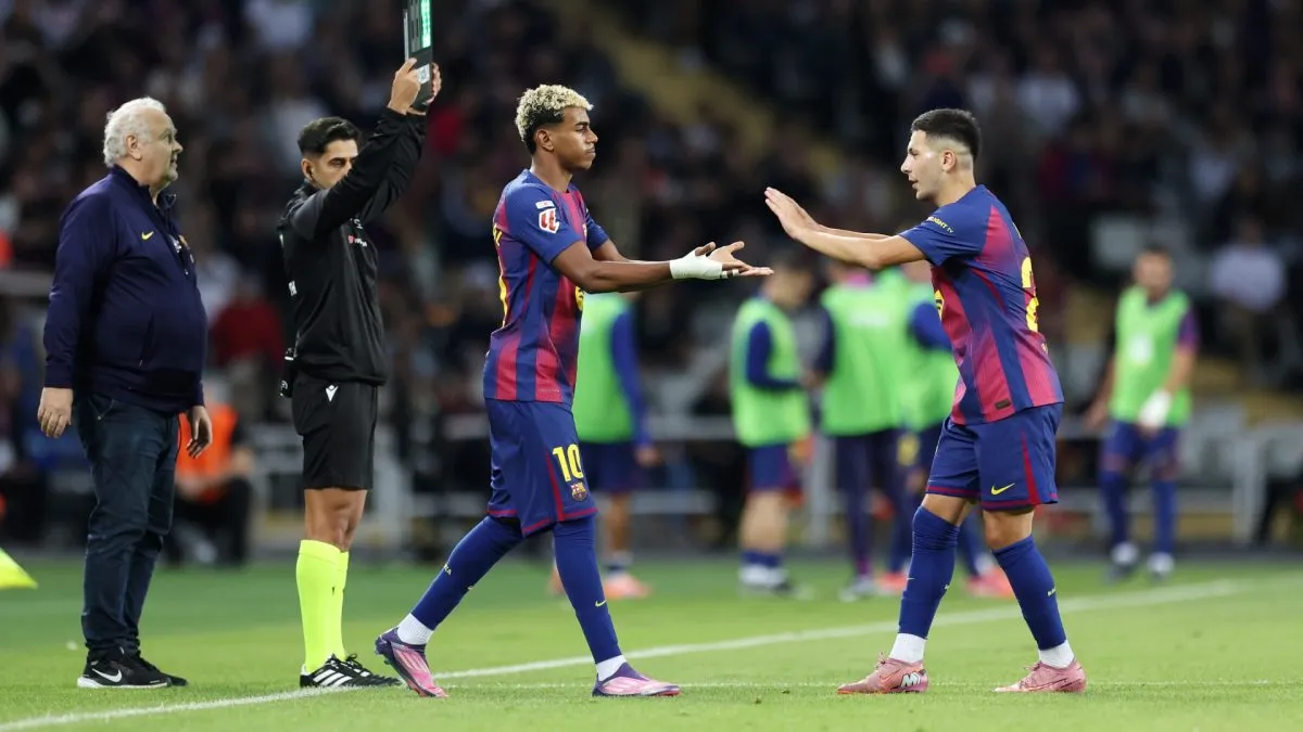 Lamine Yamal of FC Barcelona is brought on for Roony Bardghji during the LaLiga EA Sports match between FC Barcelona and Real Sociedad.