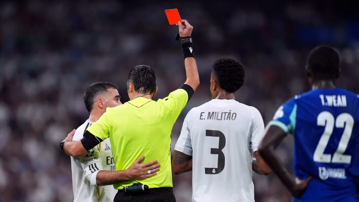 Dani Carvajal of Real Madrid is shown a red card by Referee Irfan Peljto during the UEFA Champions League 2025/26 League Phase MD1 match between Real Madrid C.F. and Olympique de Marseille.
