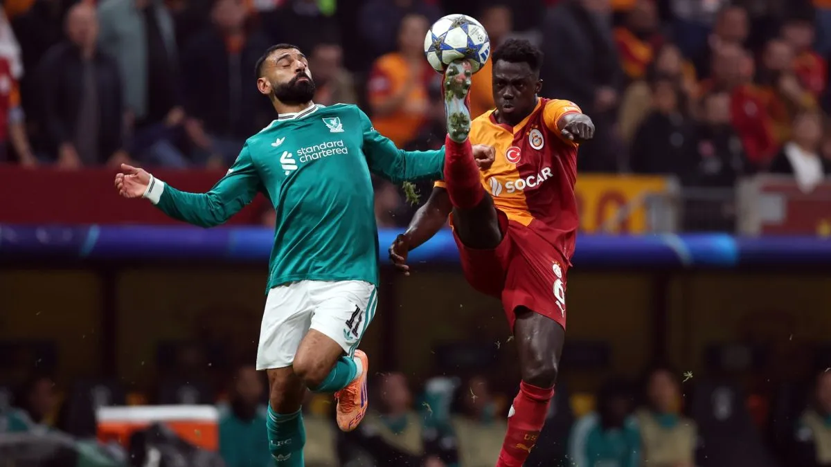 Mohamed Salah of Liverpool battles for possession with Davinson Sanchez of Galatasaray A.S. during the UEFA Champions League 2025/26 League Phase MD2 match between Galatasaray A.S. and Liverpool FC.