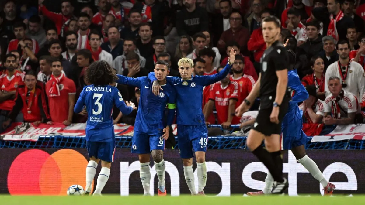 Marc Cucurella, Enzo Fernandez and Alejandro Garnacho of Chelsea celebrate after Richard Rios of Benfica (not pictured) scored an own goal and Chelsea's first goal.