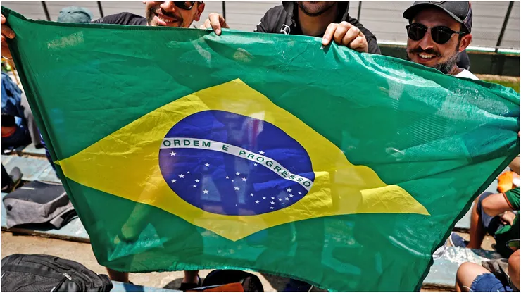 Fans with a Brazil flag